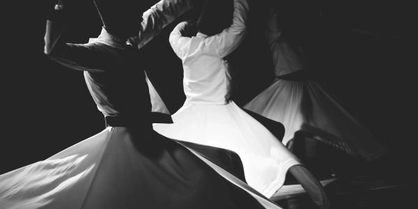 Whirling dervishes performing at a cultural celebration